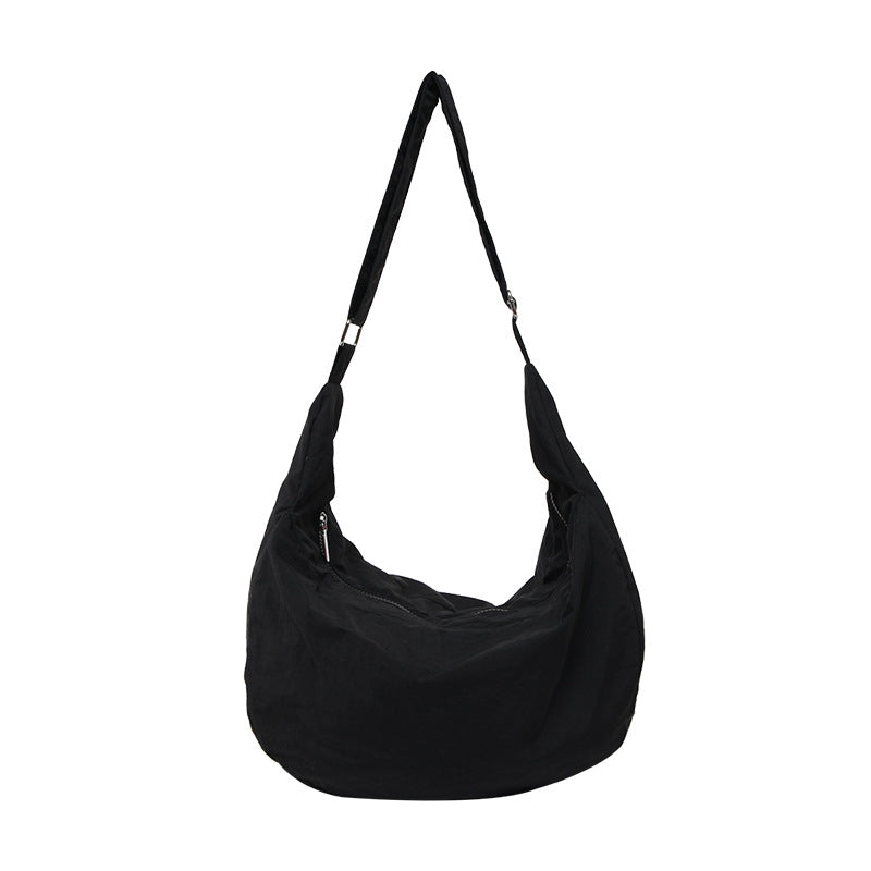 Lumi lightweight crescent bag