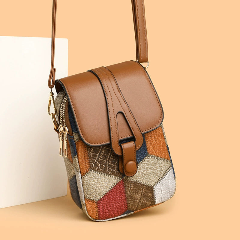 Bagviera compact phone crossbody bag, hanging view with gold hardware