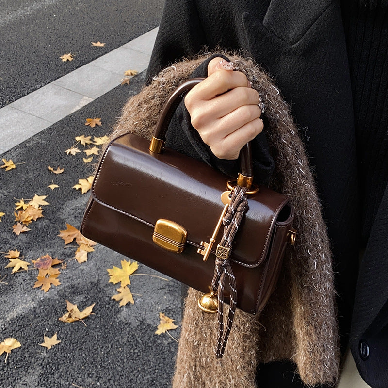 Cora Lock Box Bag, coffee hand carry