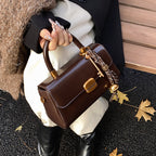 Cora Lock Box Bag, coffee handheld