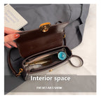 Cora Lock Box Bag, interior