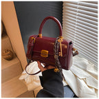 Cora Lock Box Bag, burgundy closeup